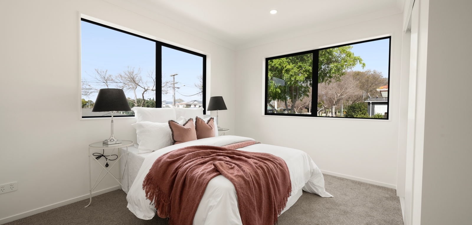 Bedroom within a completed 166 Princes Street East home