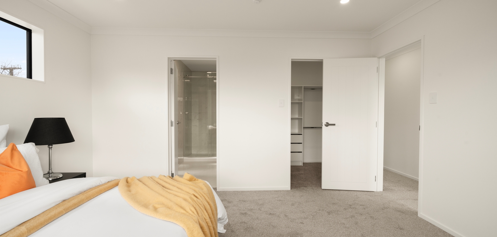 Principal bedroom with built-in storage