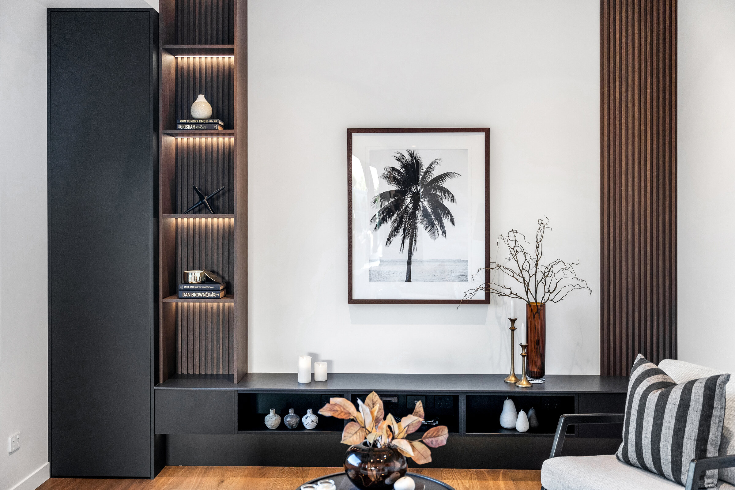 Living area with a feature fireplace and sculpted stone surround