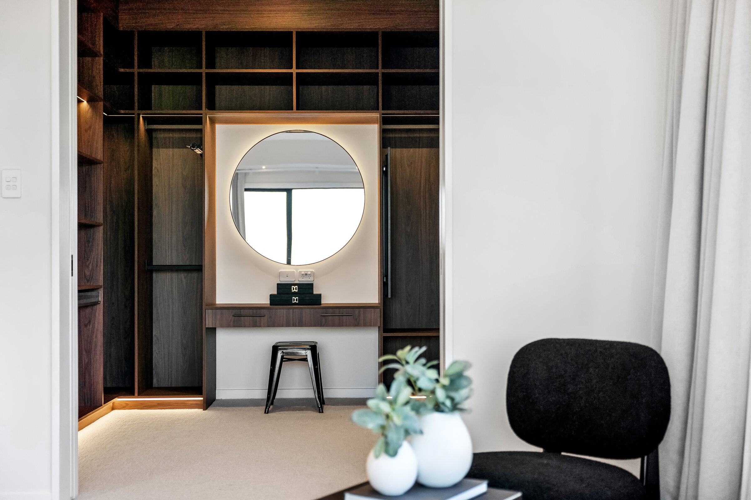 Primary bathroom with freestanding bath and layered lighting