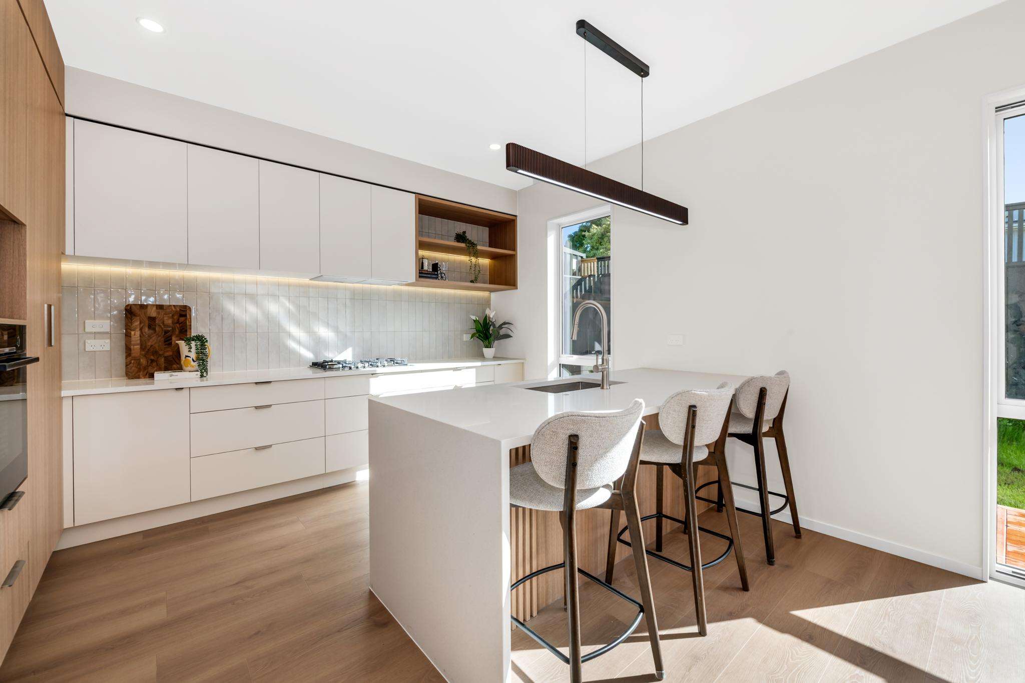 Kitchen island and warm timber detailing