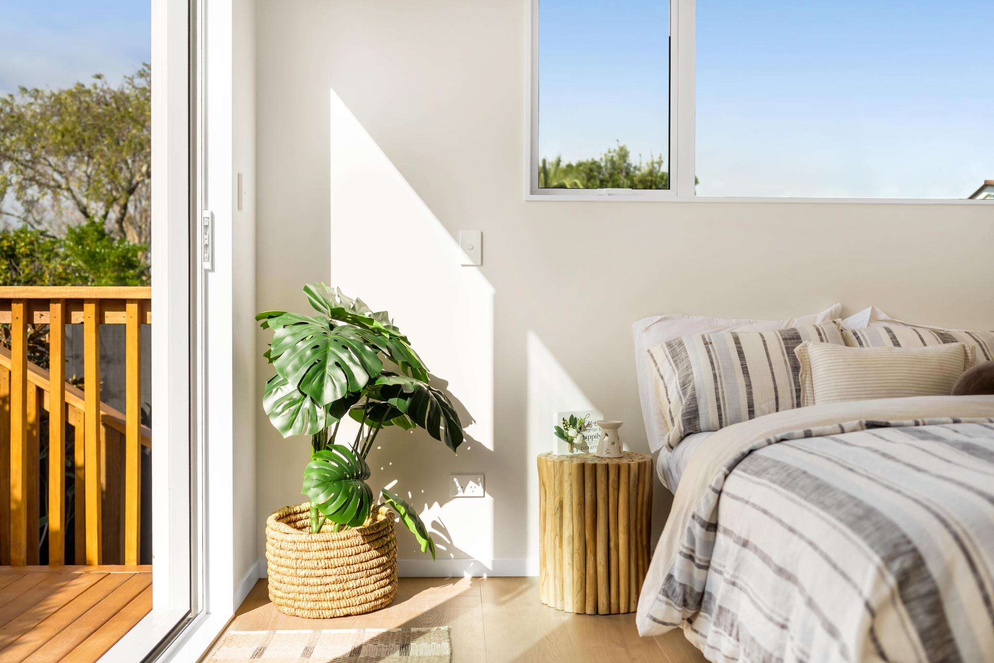 Upper bedroom with access to a small deck