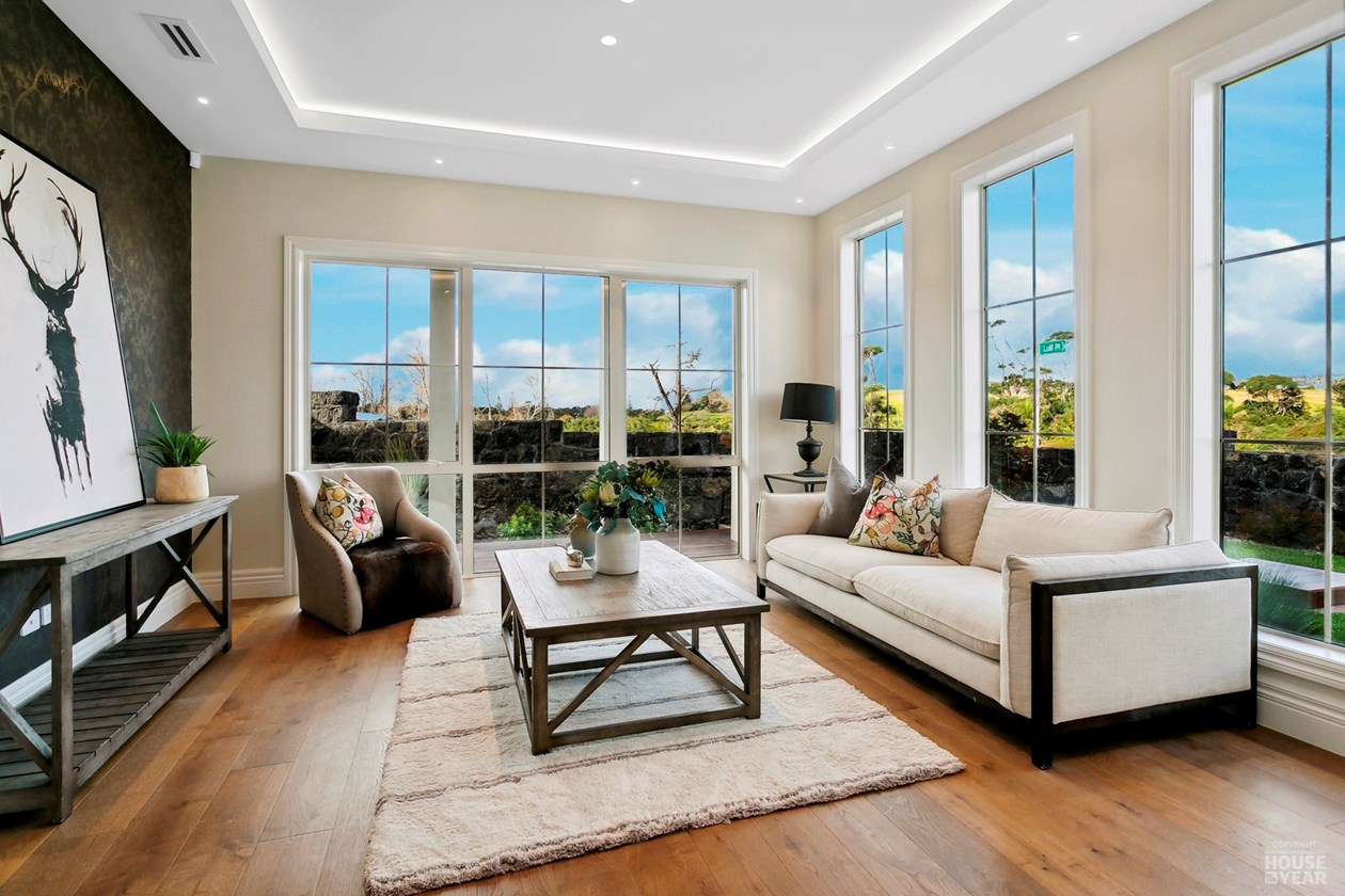 Living room opening toward the Long Bay setting