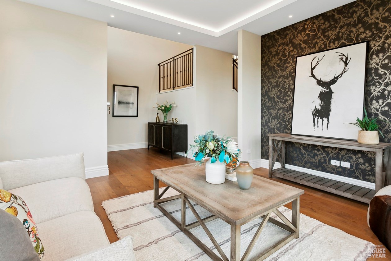 Lounge with feature wall and built-in entertainment joinery