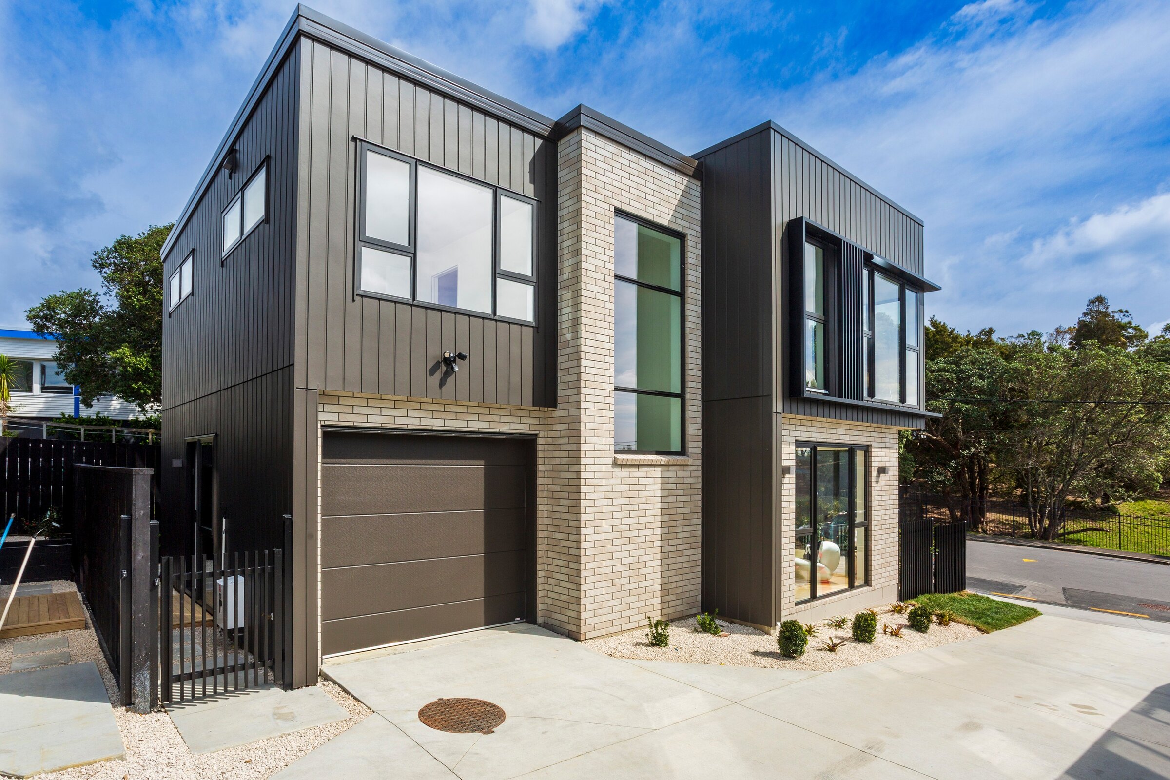 Street-facing home at 10 Agathis Avenue in Mairangi Bay