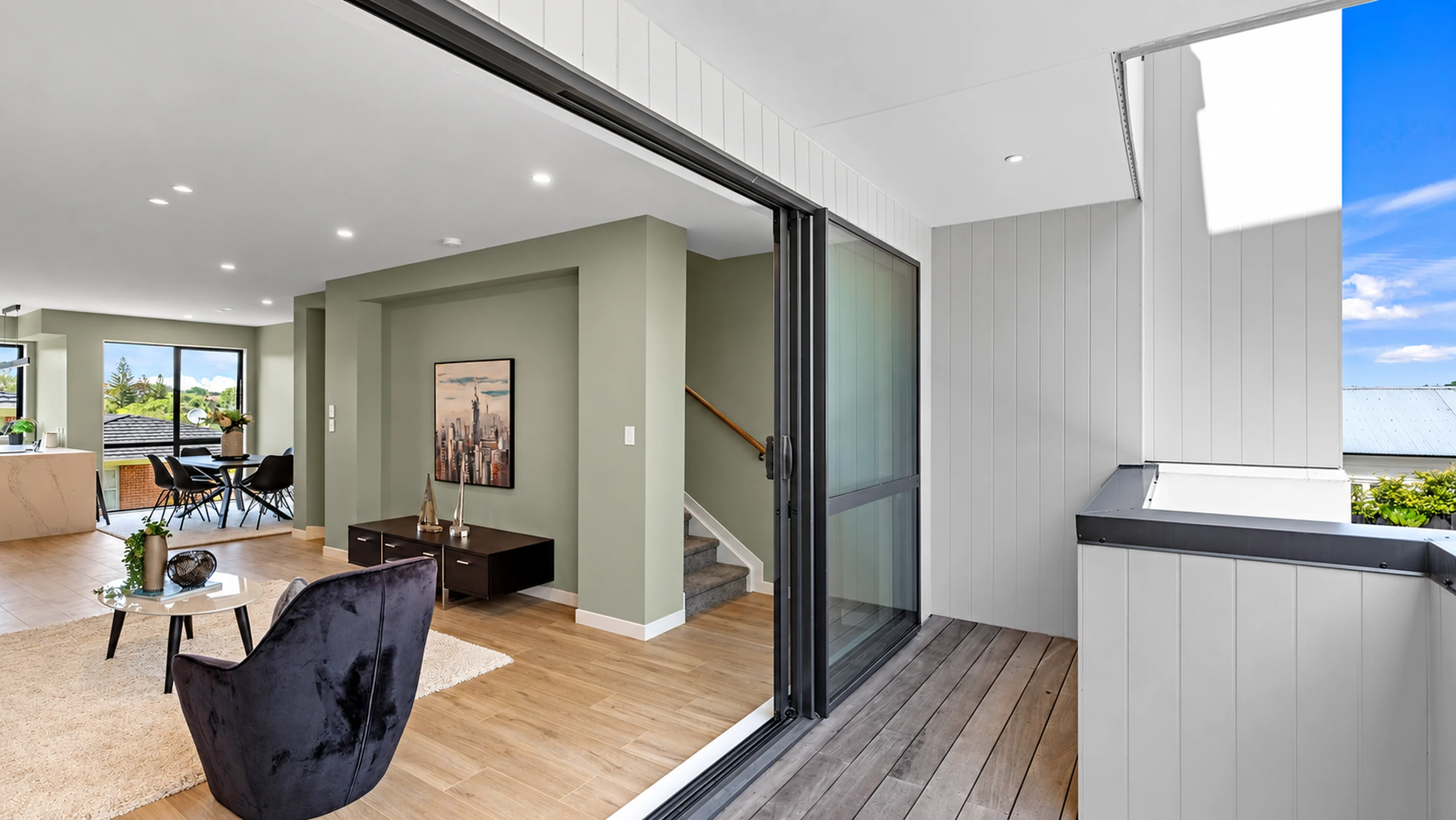 Living area opening to a sheltered outdoor terrace