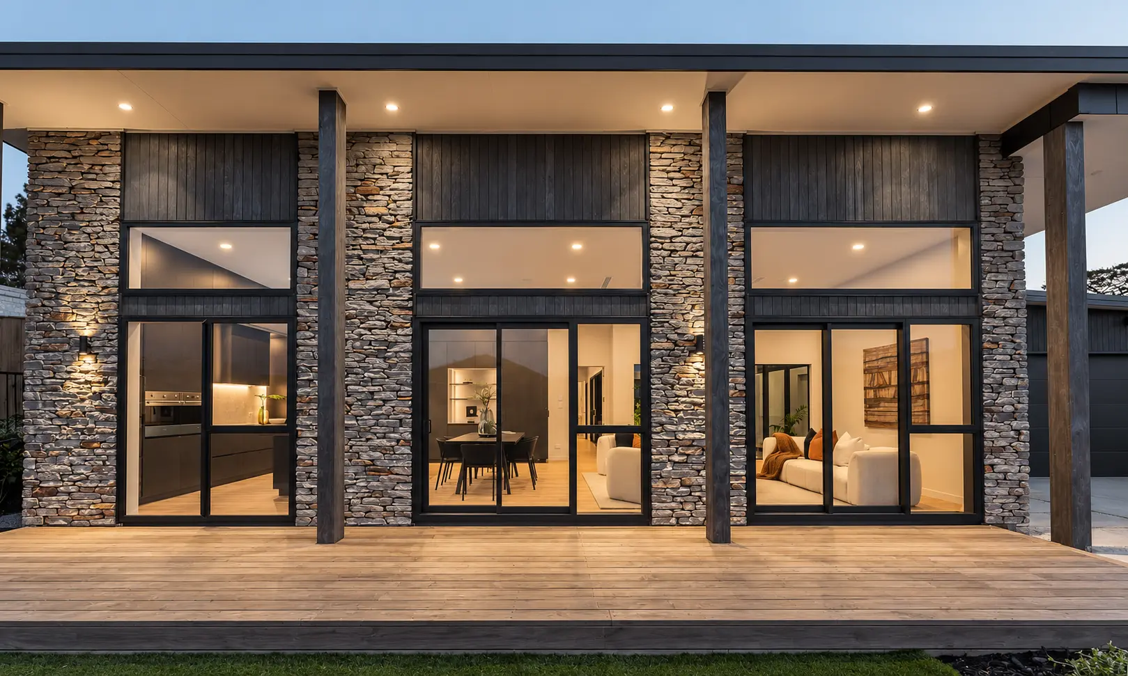 Covered outdoor terrace with stone columns and garden outlook