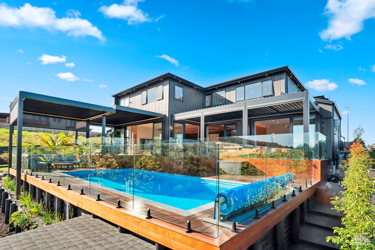 Award-recognised Kewa Road home with pool, pergola and dark cladding