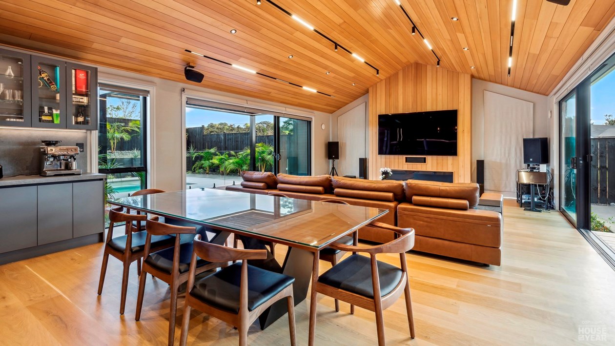 Open-plan living and dining room at 44 Kewa Road