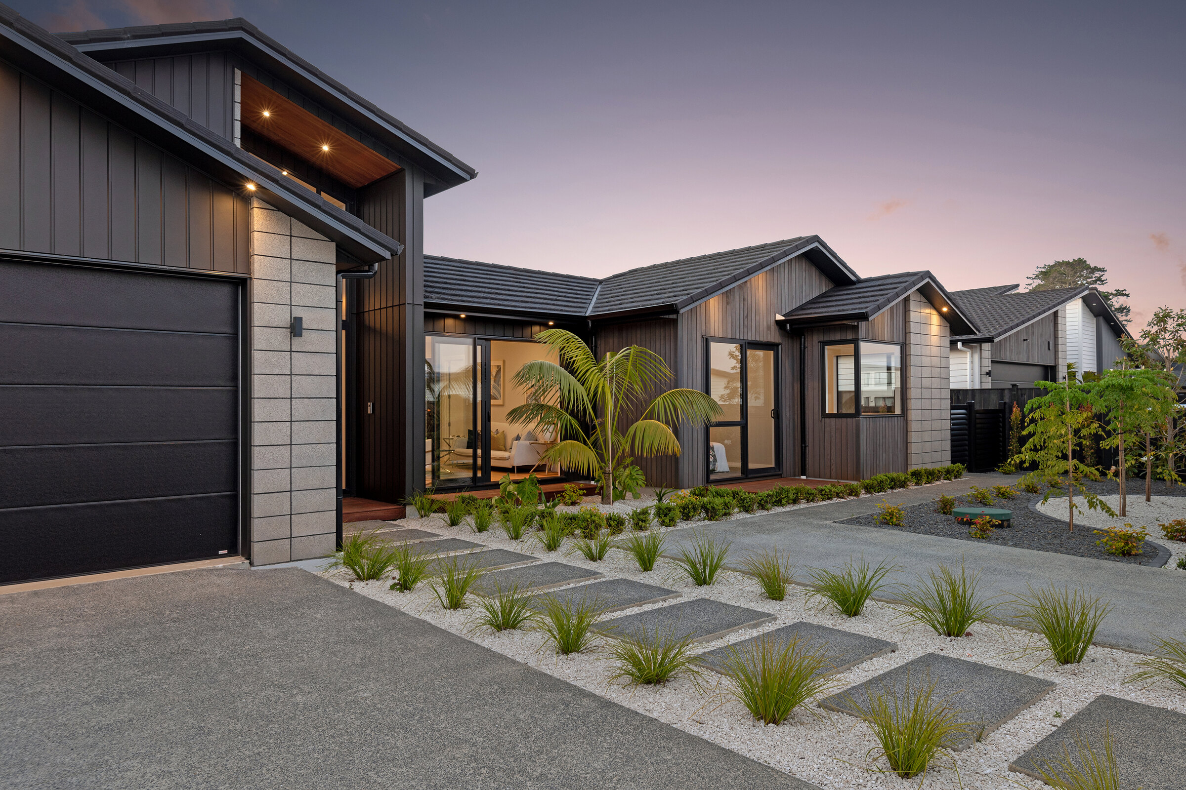 Street-facing view of the completed home at 56 Kewa Road