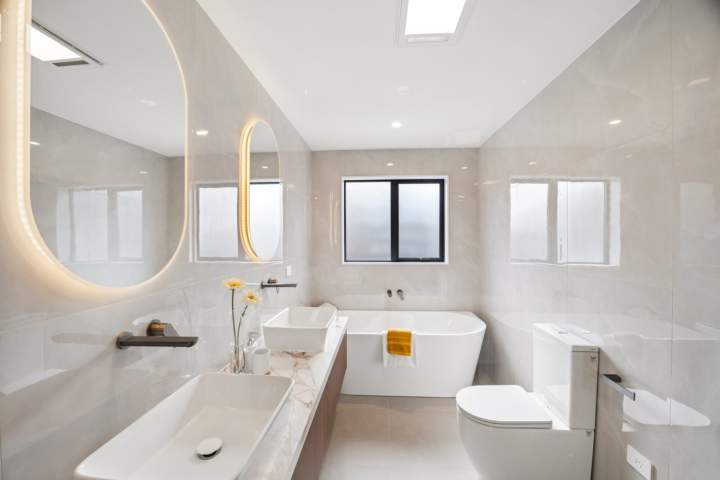 Principal bathroom with freestanding bath at 73 Kewa Road