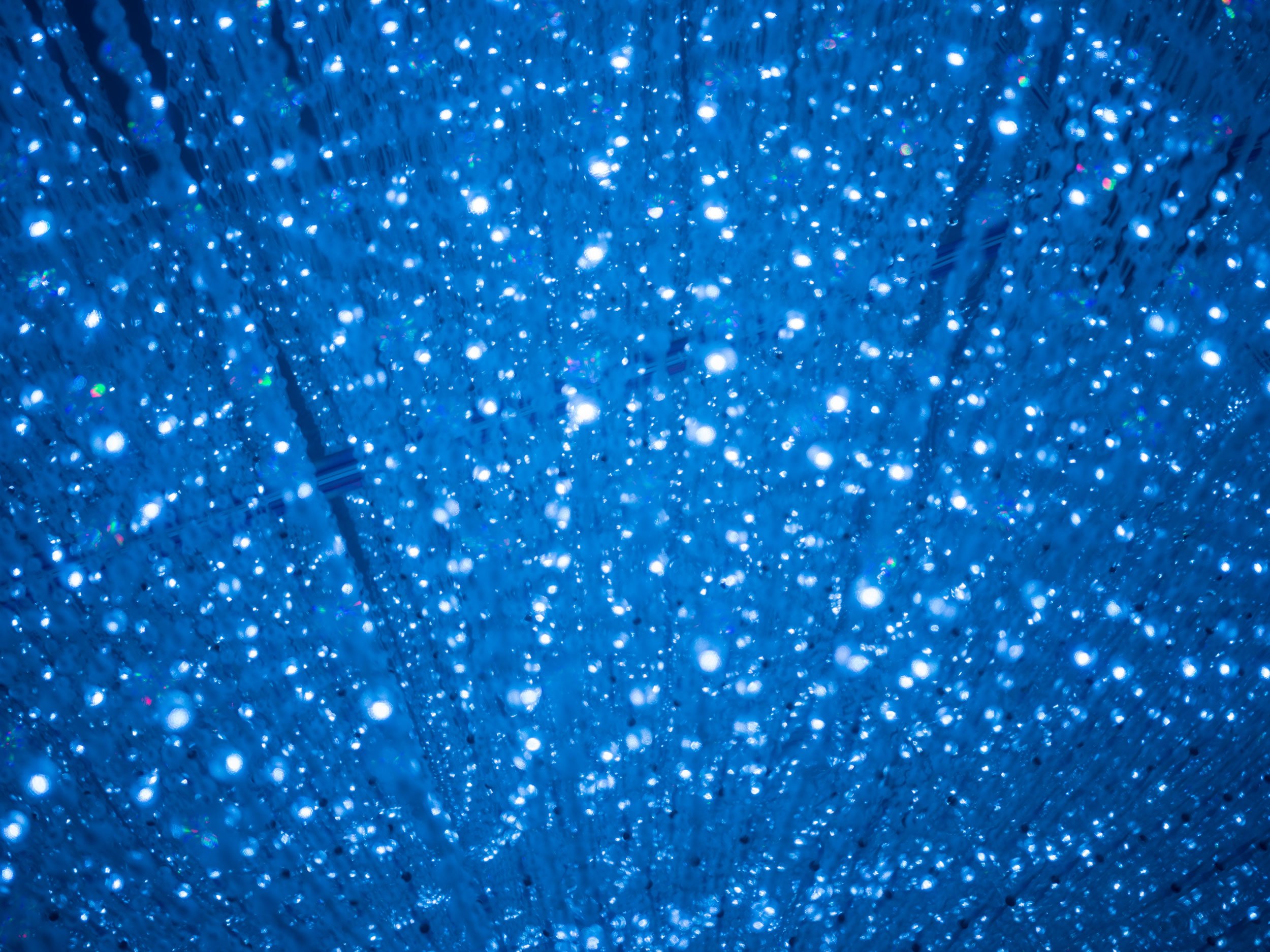 Blue mirrored light installation at 3 Mirage