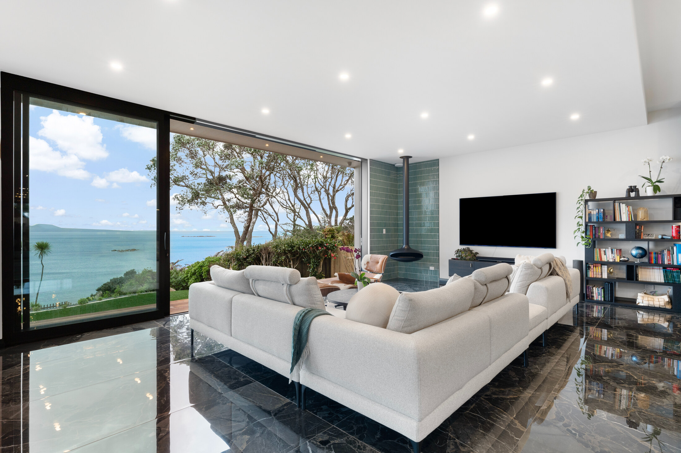 Living space overlooking the Hauraki Gulf from 26 Rock Isle Road