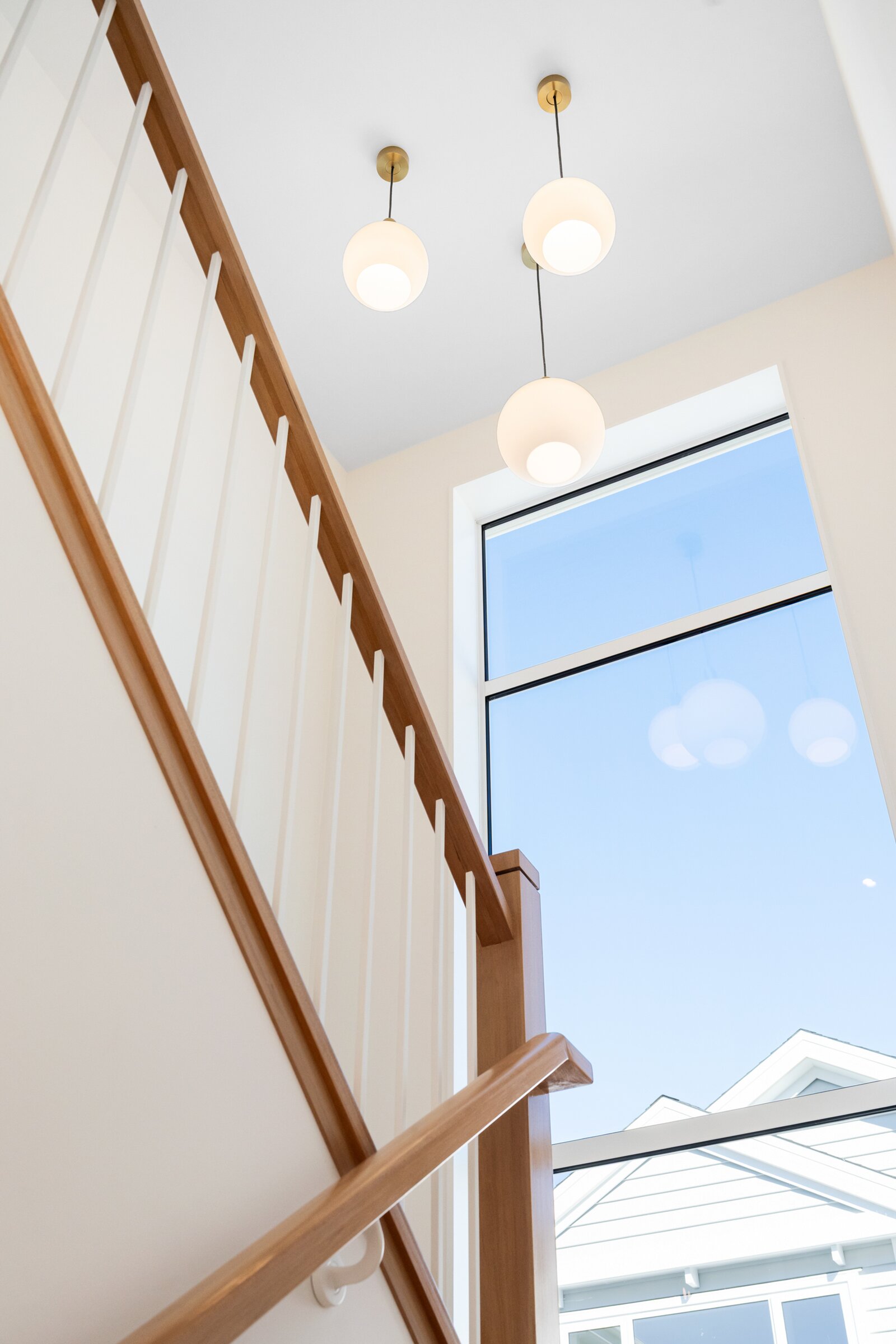Timber stair and pendant lighting at William Souter Street