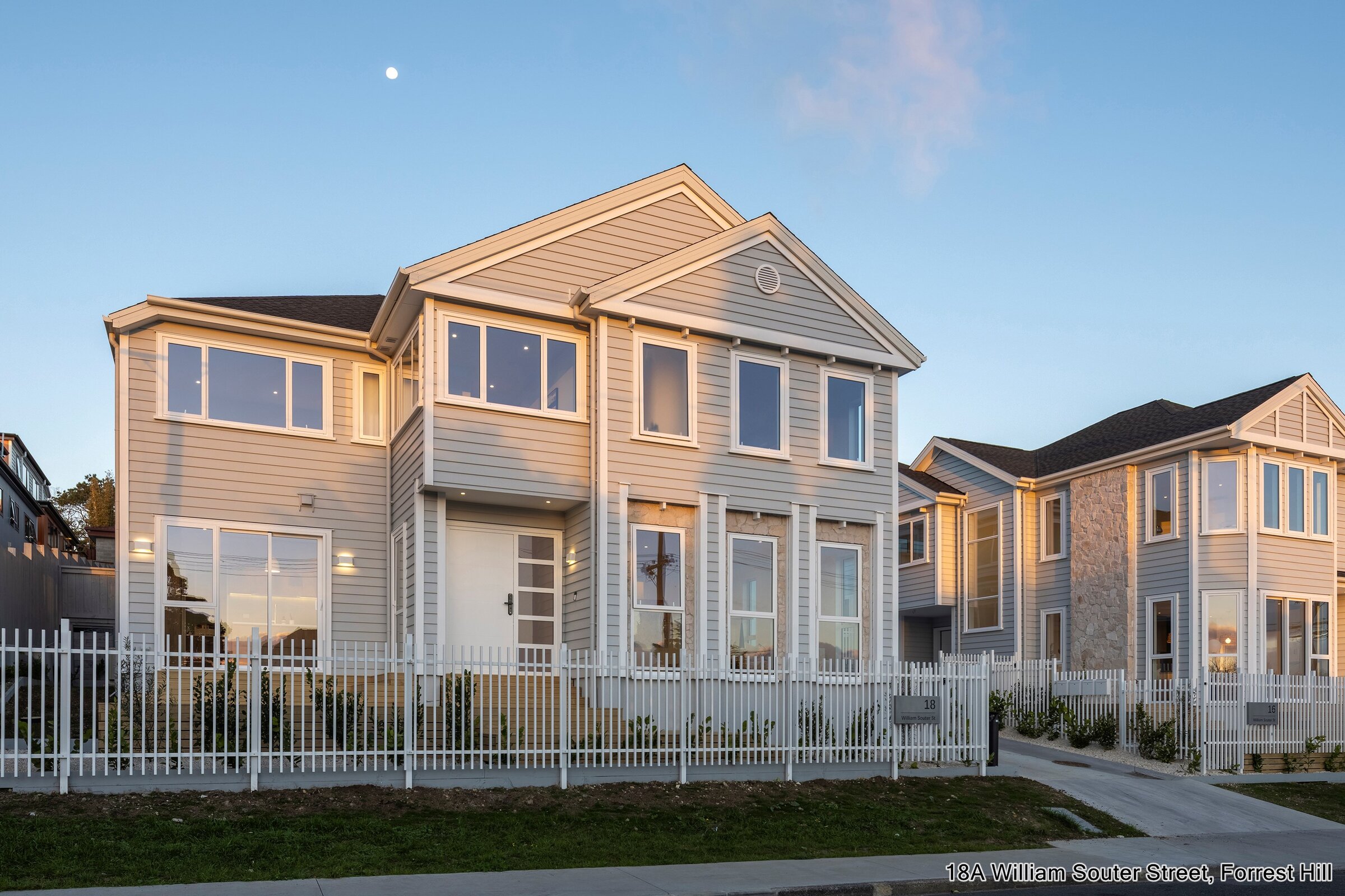 Street-facing weatherboard homes at William Souter Street