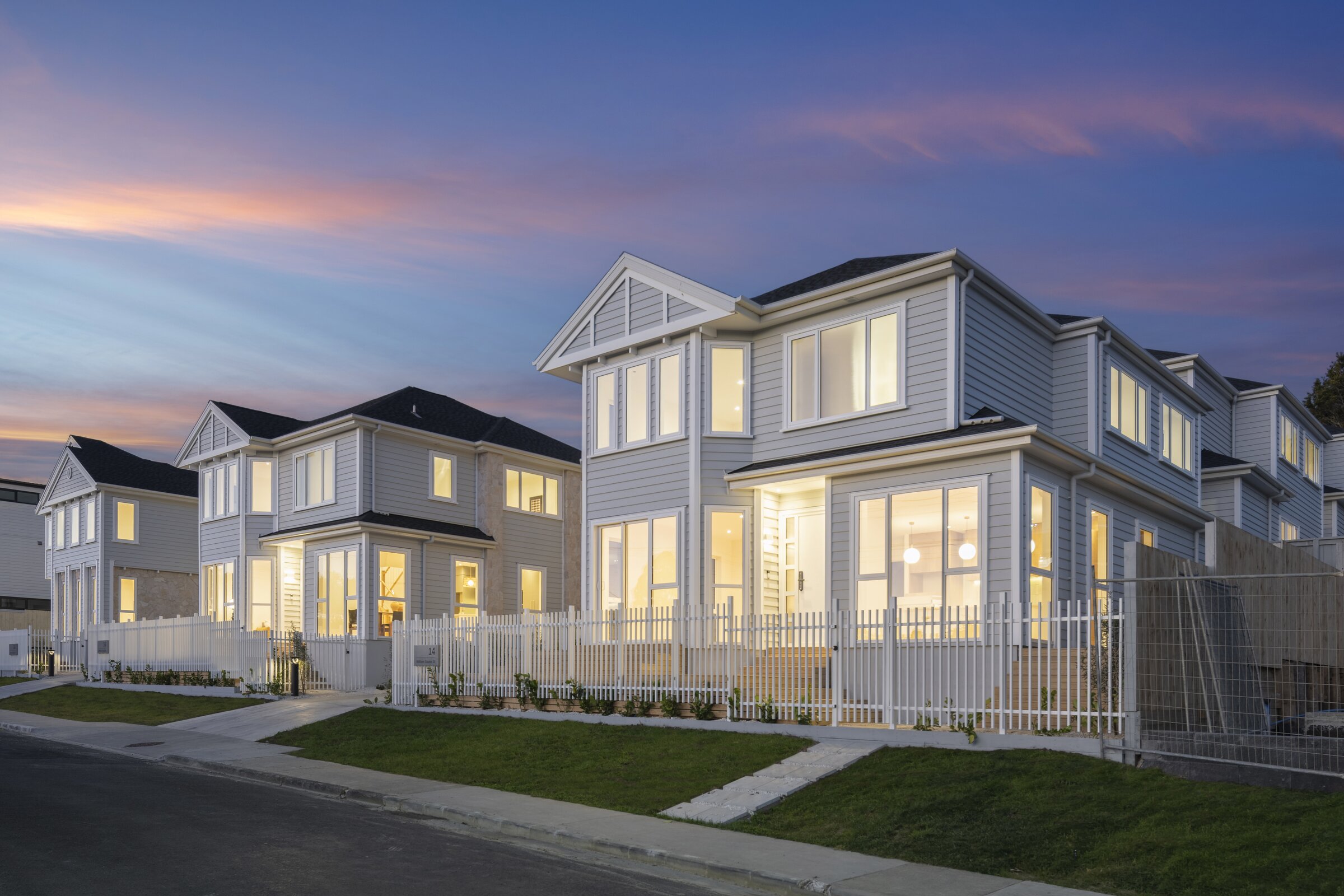 Dusk view across the completed standalone homes